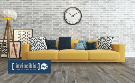 invincible flooring with yellow sofa